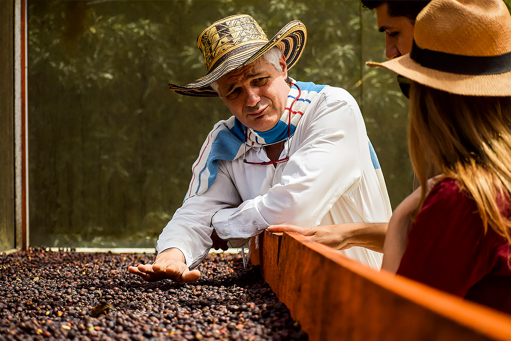 Java Been's Gourmet FAQ's photo of a farmer answering questions